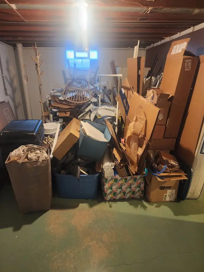 Roll-off dumpster container at job site for 20 Yard Dumpster Rental in Flat Rock